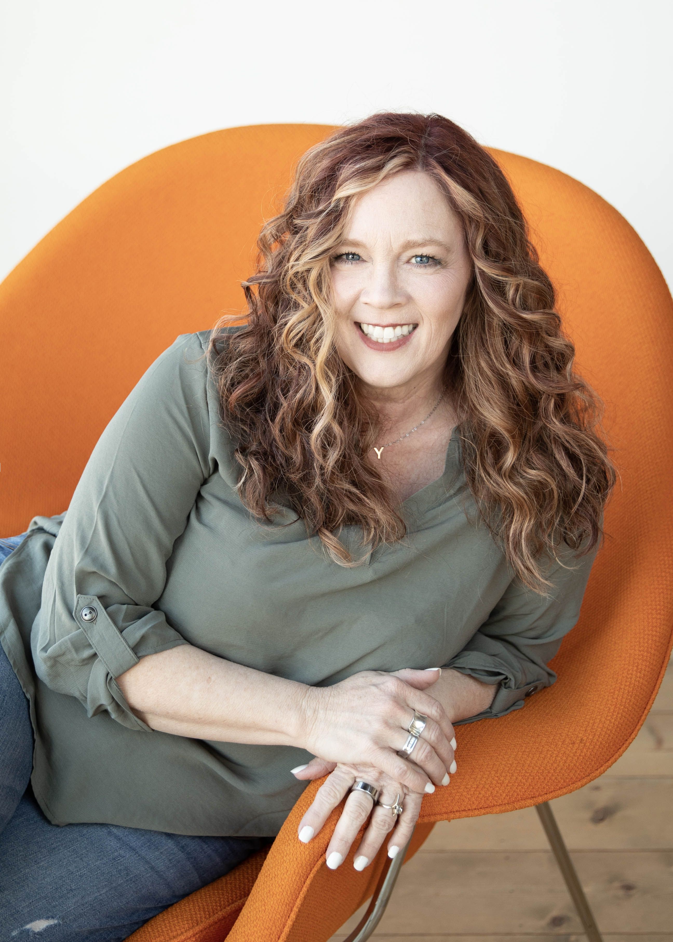 Lisa posing on the chair