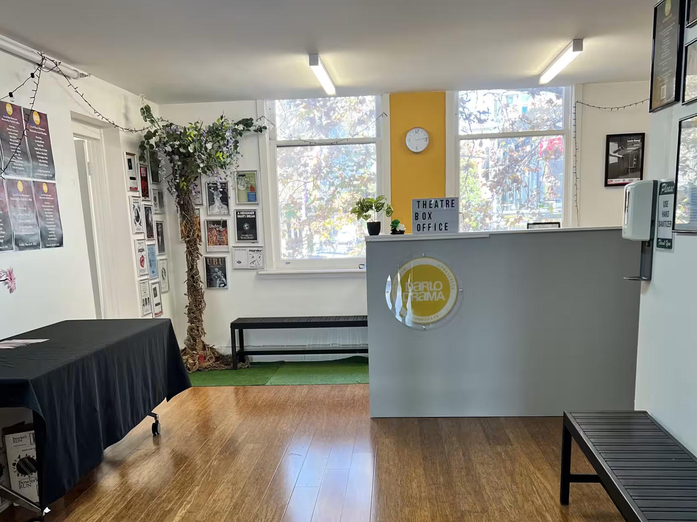 A cozy office space with a table and chairs, perfect for a small team to collaborate and work efficiently. Darlinghurst Venue hire