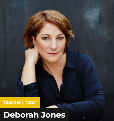 Deborah Jones - A short haired blonde woman wearing a navy blue polo