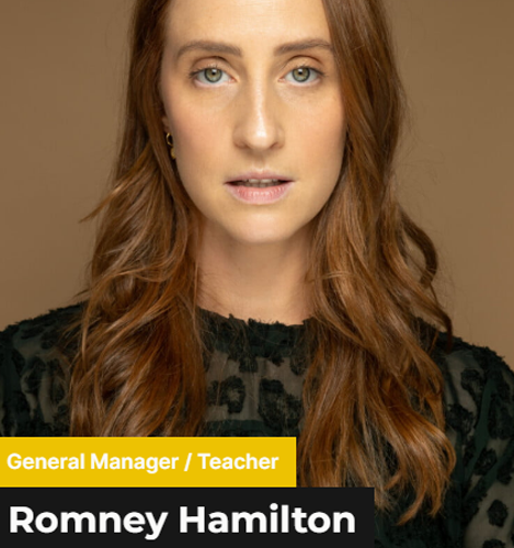 Romney Hamilton - A fierce lady with a long brown hair wearing a black patterned blouse