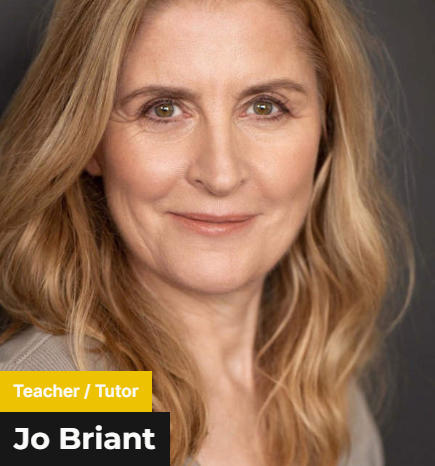 Jo Briant - A middle aged woman with a blonde hair wearing a beige shirt