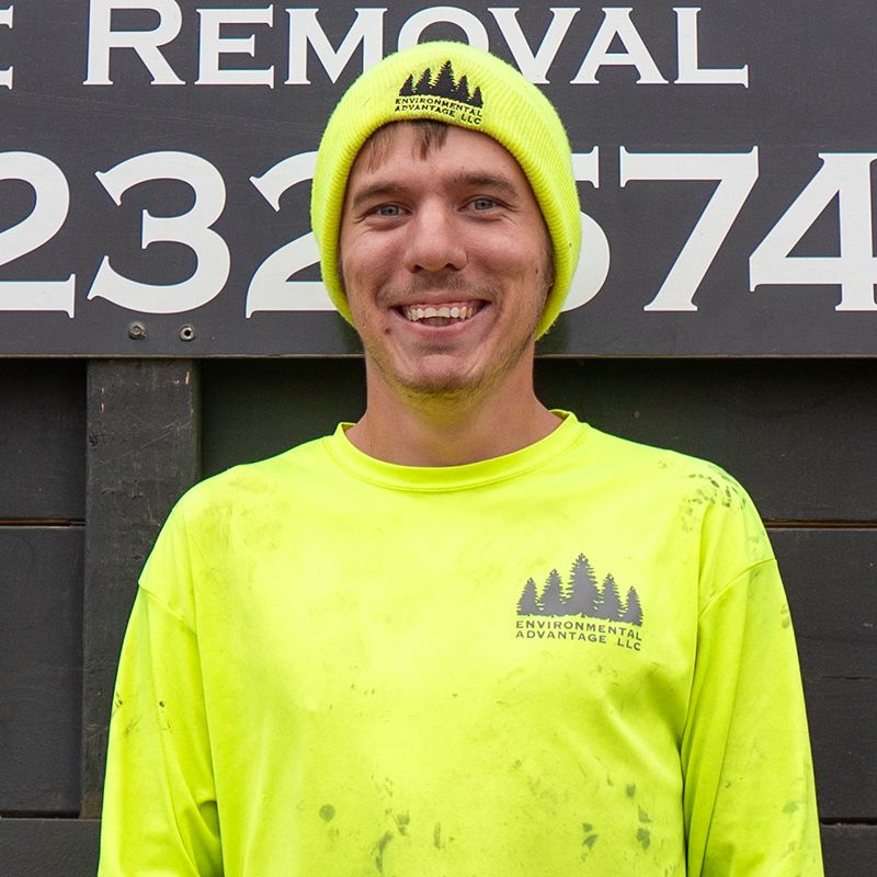 Jonah, tree steward at Environmental Advantage, expert in tree health and ecosystem maintenance in Minnesota.