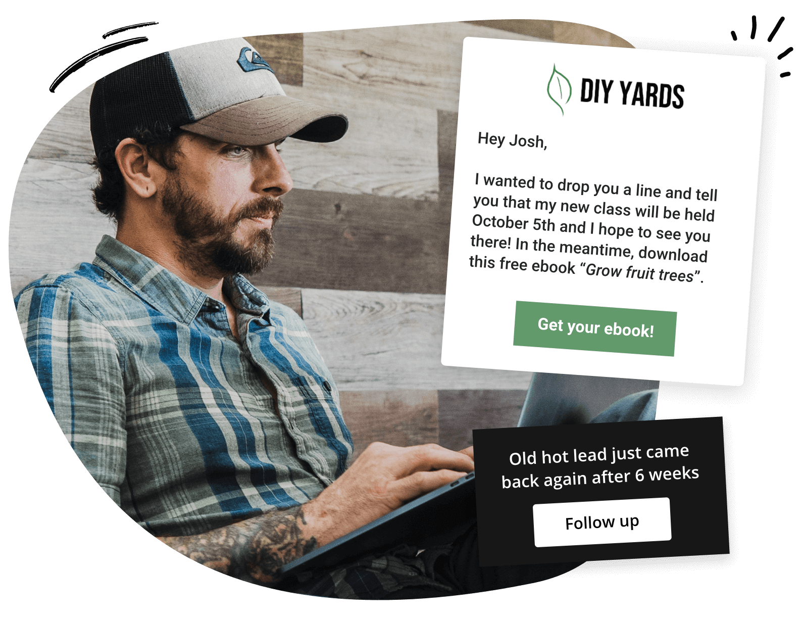 A man in a hat with a laptop on his lap.