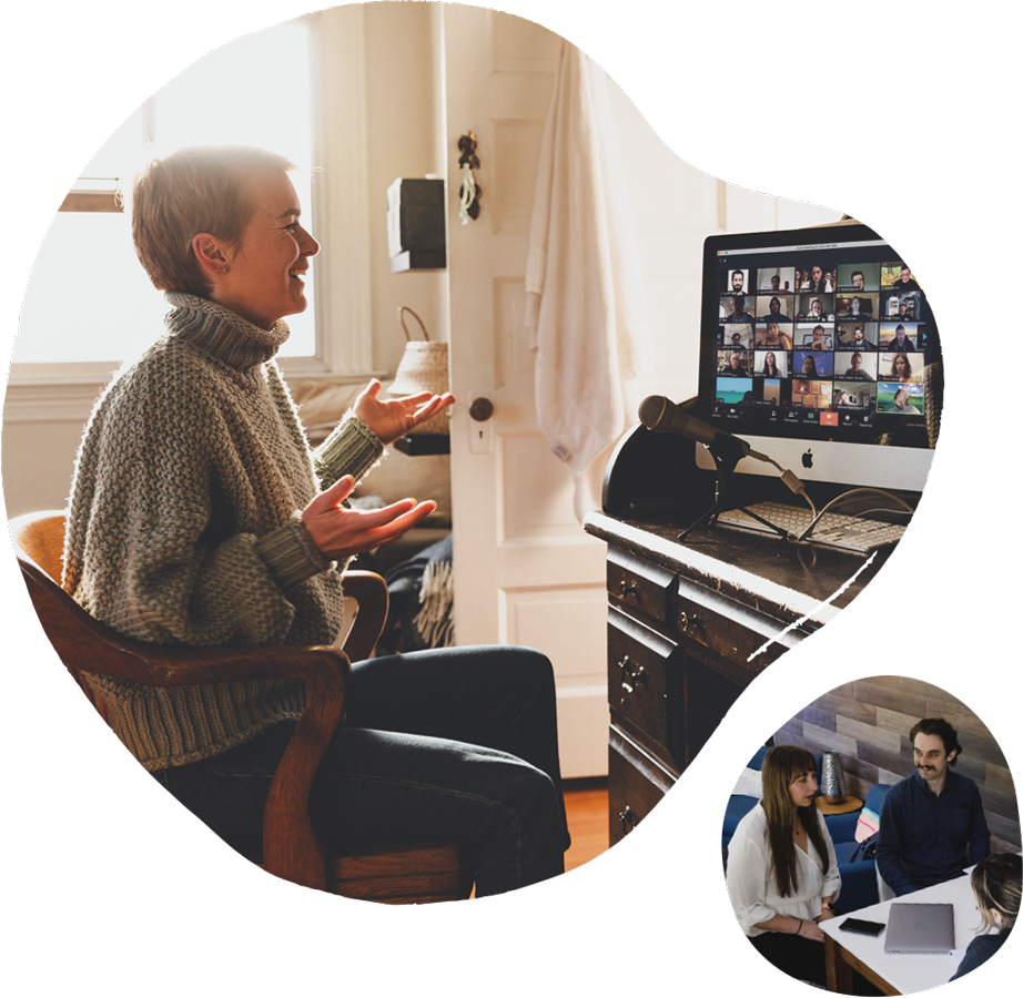 A woman sitting at a desk on a zoom meeting.