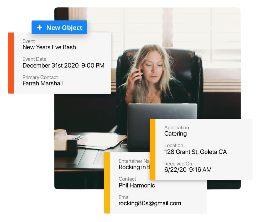 An image of a person on a phone, looking at upcoming appointments on their laptop.