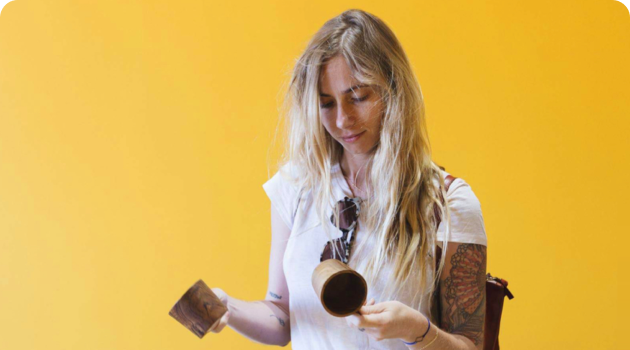 An image of a person comparing two items to purchase