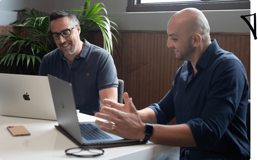 An image of young entrepreneurs working on laptop computers.