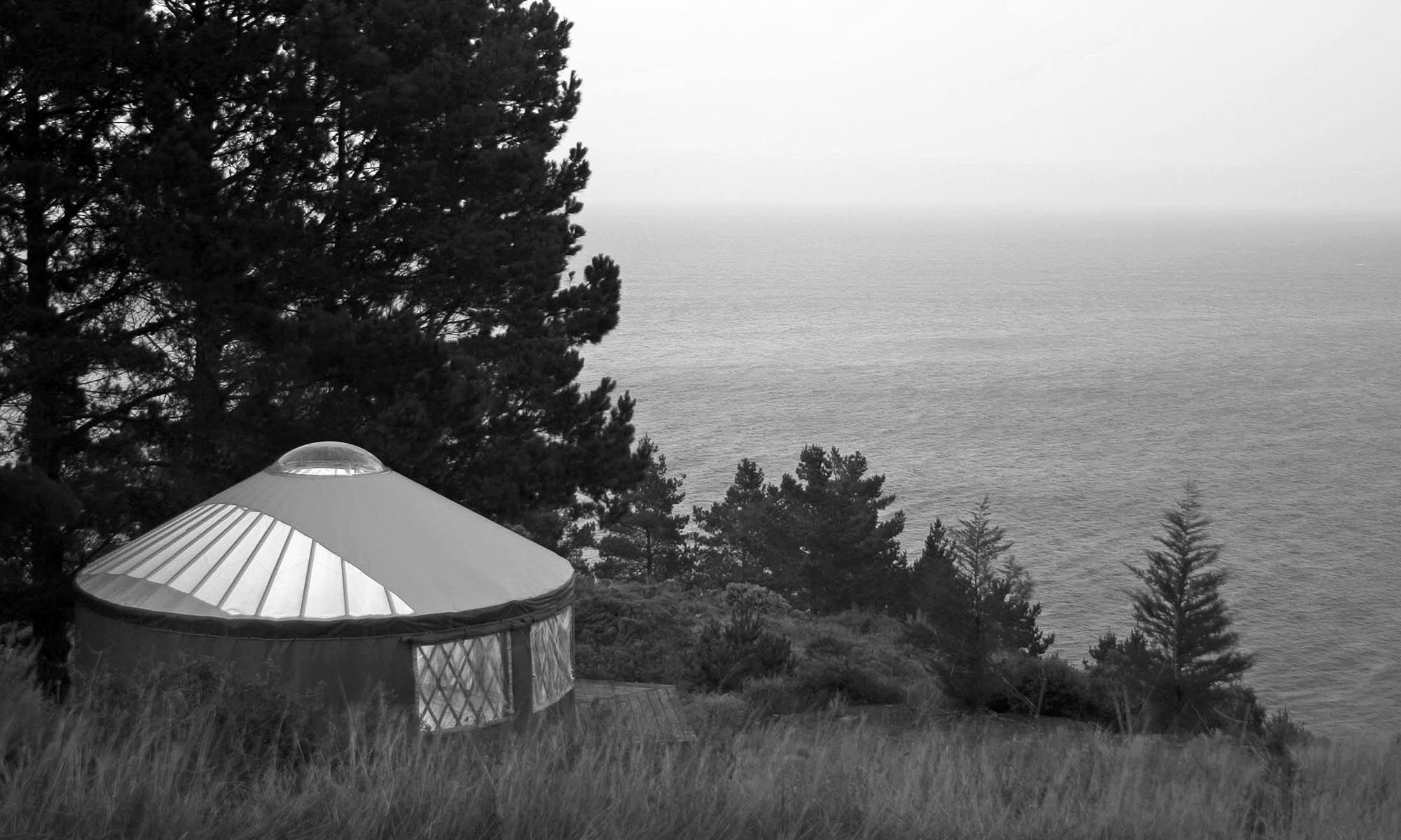 a yurt on a seacliff